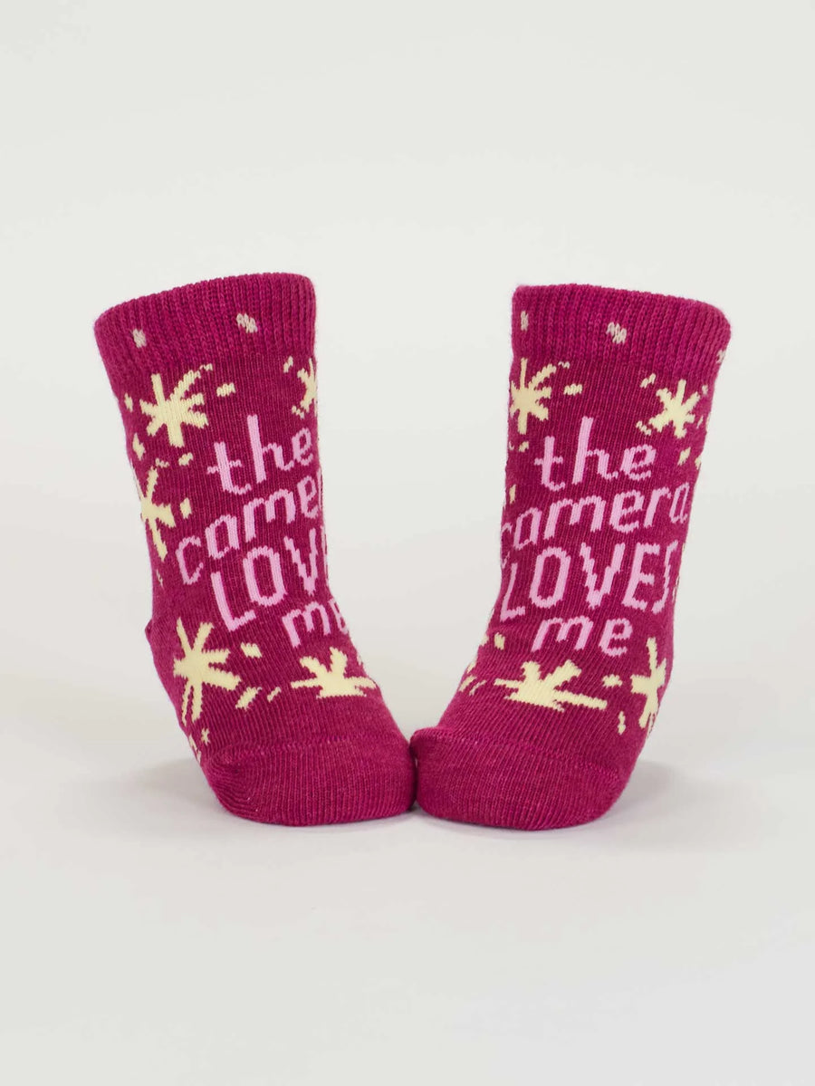 The Camera Loves Me/ I Got One Brewing | Baby Socks | Blue Q